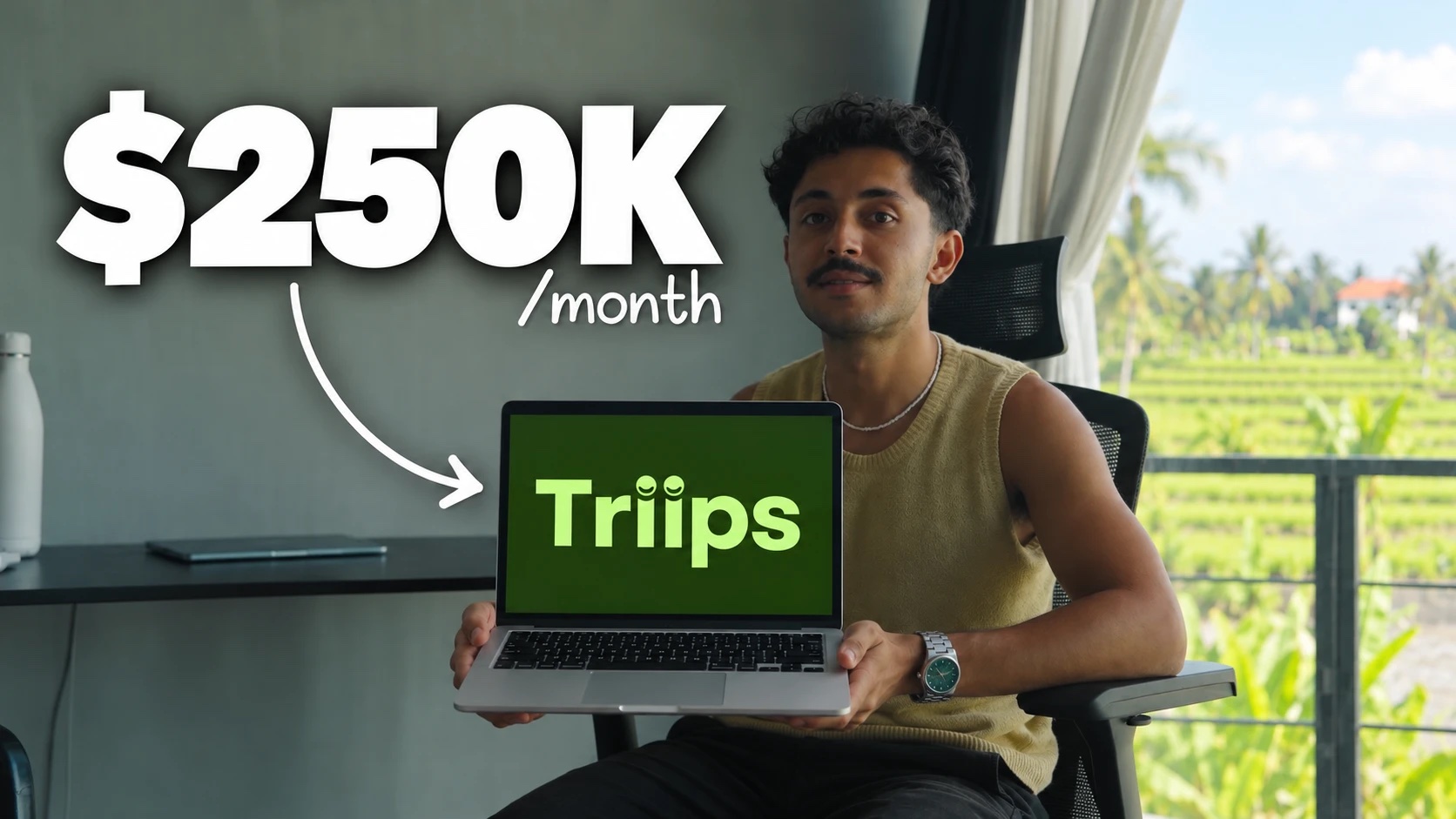 Omar Boukhabrine holding a laptop showing Triips, $250K/month